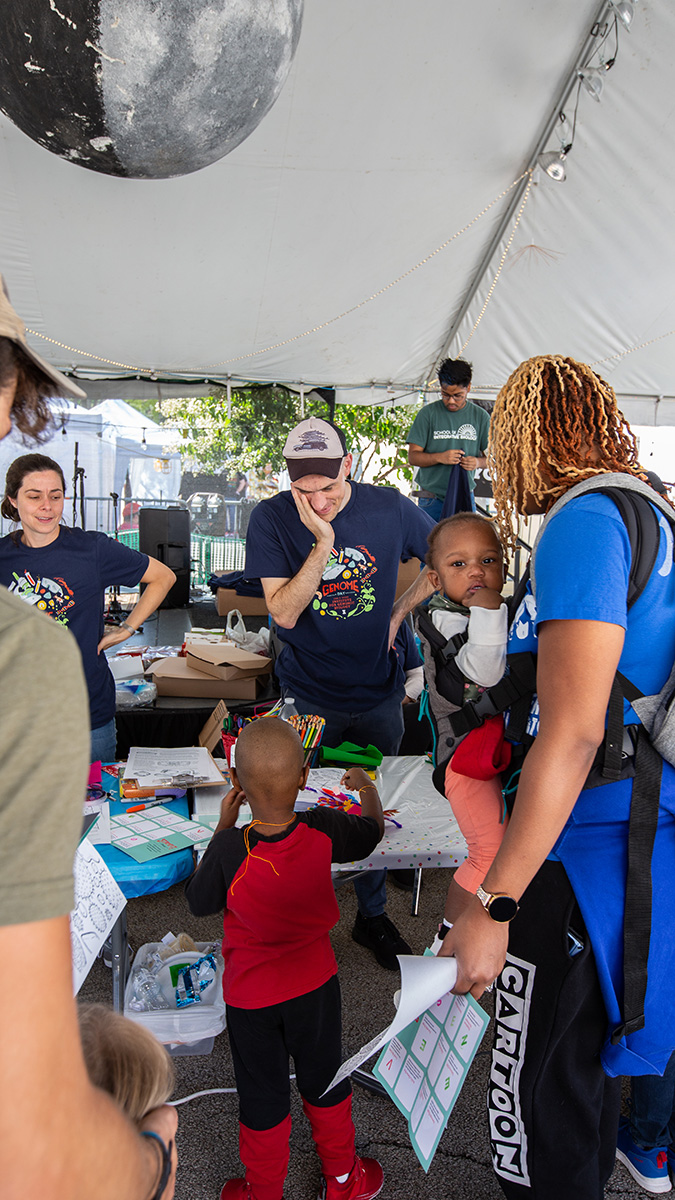 Families at a booth