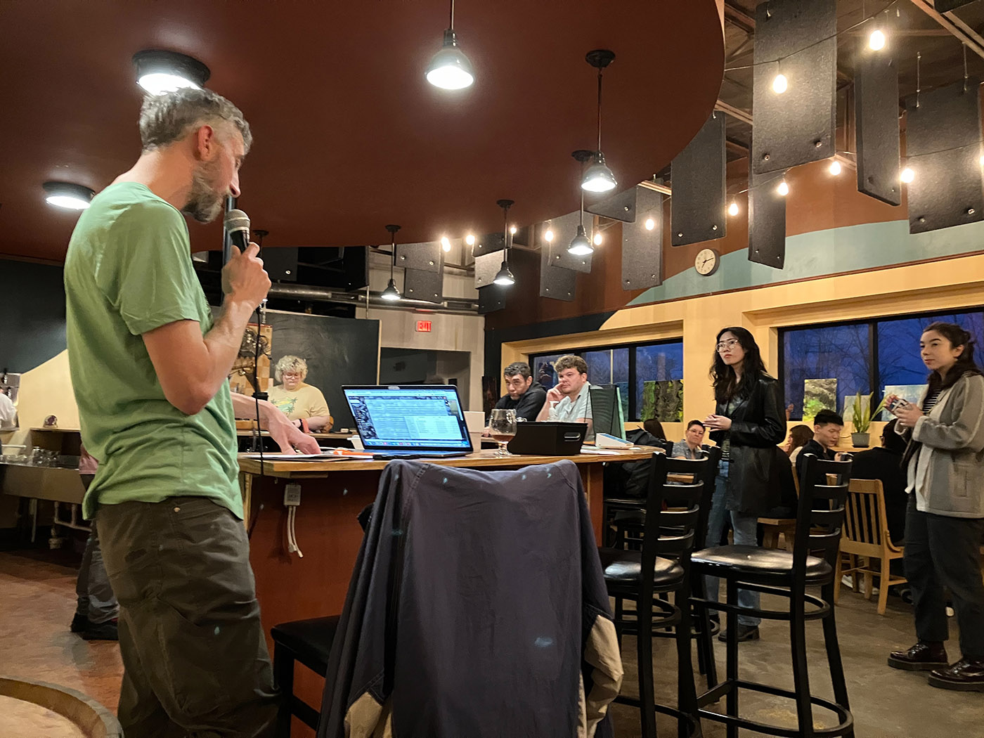 Dan Urban moderating the PI Day Trivia Night, March 14, 2024