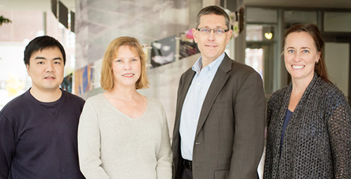 Members of the Gene Networks in Neural & Developmental Plasticity theme found that distantly related organisms share key genetic mechanisms that help them respond to threats. From left, bioengineering professor Jian Ma, cell and developmental biology professor Lisa Stubbs, entomology professor and Institute for Genomic Biology director Gene Robinson, and animal biology professor Alison Bell.