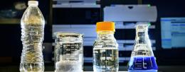 Researchers used microbes to convert plastic waste into pyruvate, an essential energy source for microbes that use it to generate other useful products. As a proof-of-concept experiment, they converted polyethylene terephthalate, or PET, from plastic bottles into the blue dye indigoidine. Photo by Fred Zwicky