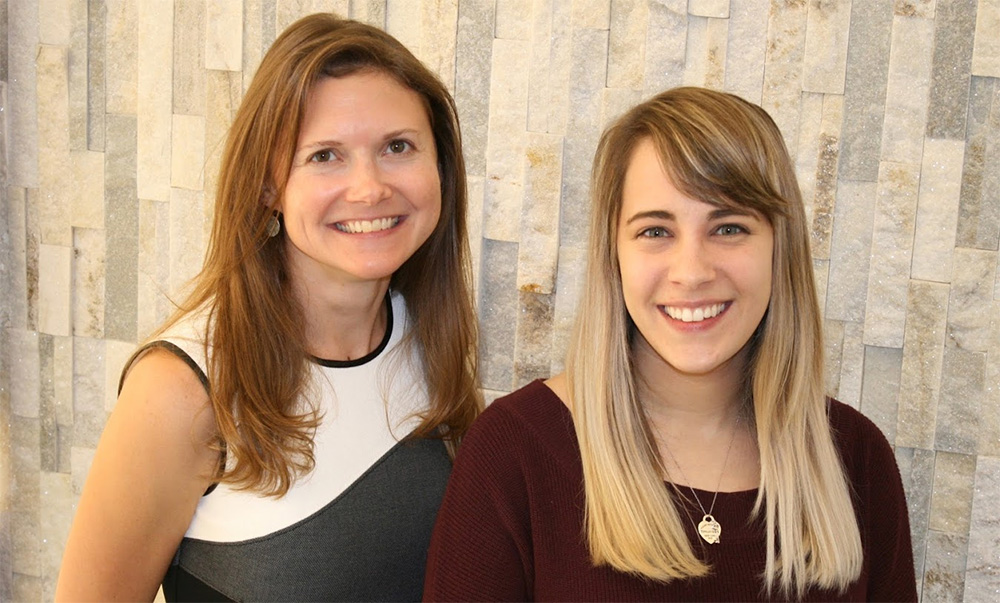 Megan Dailey, left, and Elizabeth Davis, right, both from the Department of Animal Sciences at the University of Illinois, demonstrate the autonomic nervous system has direct control over stem cell proliferation in the intestinal epithelium. Photo credit: Lauren D. Quinn, University of Illinois.