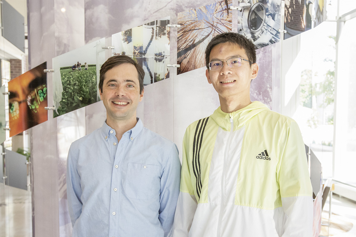 Chris Brooke, an associate professor of microbiology (left) with lead author and graduate student Tongyu Liu