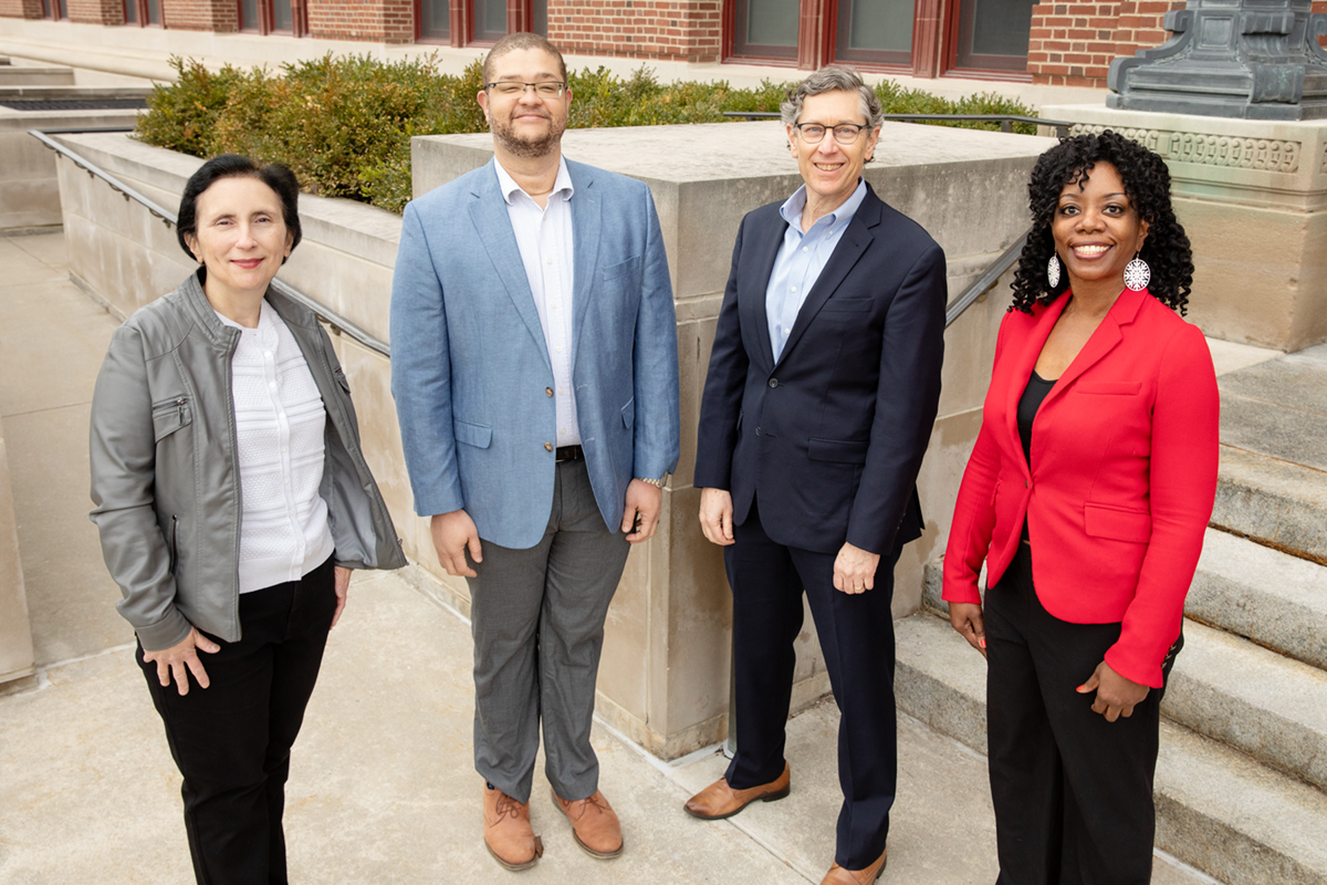 Living in a violent neighborhood increased stress-related gene activity in low-income Black mothers, a study from the University of Illinois and collaborators found.  Illinois professors pictured, from left: Sandra Rodriguez-Zas, animal sciences; Andrew Greenlee, urban and regional planning; Gene Robinson, entomology and interim dean of the College of Liberal Arts and Sciences; and Ruby Mendenhall, sociology and African American studies.