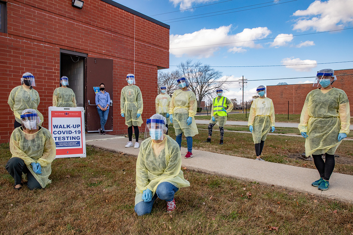 Workers gather at the Rantoul Parks and Recreation Department before hosting a pop-up test clinic. Rantoul has had outbreaks among essential worker populations, and the LHEAP team hopes to develop a better understanding of COVID-19 infection rates and why some areas generate acute infection clusters.