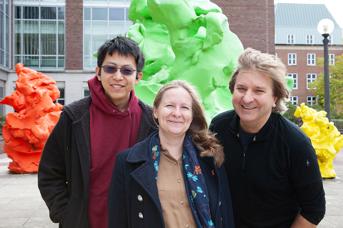 From left, Zihan Wang, Veronika Dubinkina, and Sergei Maslov developed a model to understand how different species coexist in a community.